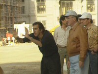 Newsies Stills - 4 - Director Kenny Ortega lining up a shot on New York Street (still from DVD featurette, 1991)