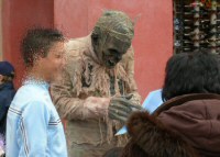 The Mummy graciously signing an autograph before mauling another victim, April 2006