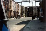 The residential side of Brownstone Street pictured around 1984, showing the grid framework from Streets of Fire above the sets. From http://www.bobbergen.com/universaltour.htm