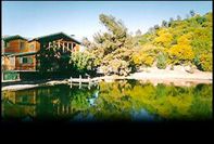 Cabin at Old Falls Lake before being moved to its current location (date unknown) Photo by universalstonecutter.