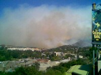 Smoke drifts across the backlot, seen from the Studio Tour bridge (photo by Christian)