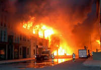2008 Fire - South side of New York Street and King Kong building engulfed in flames in the early stages of the fire - AP photo by Mike Meadows - from Chicago Tribune