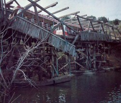 A GlamorTram in 'distress' on the bridge (from Inside Universal Studios, 1976)