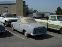 The Peugeot 403 in the transportation parking lot next to the Prop Warehouse (2006, photo by Russ, with thanks)